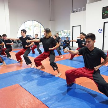 Martial arts students training together at A1A Training Centre