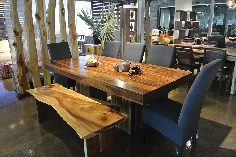 Artemano showroom with exotic solid wood dining table