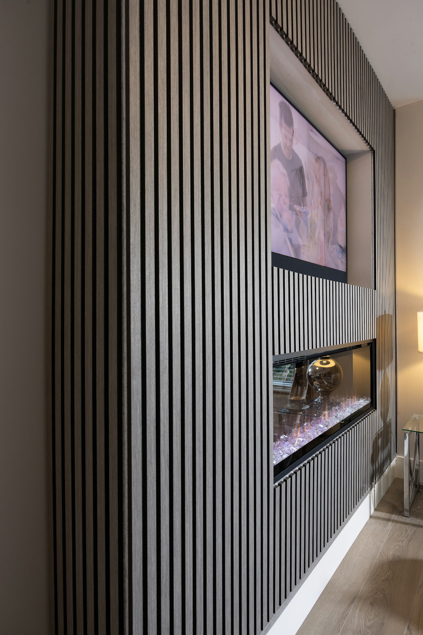 Custom wood slat feature wall with fireplace