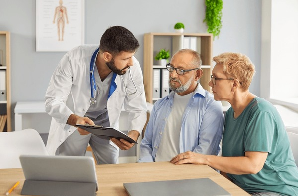 Doctor consulting with patients at Central Avenue Medical Clinic