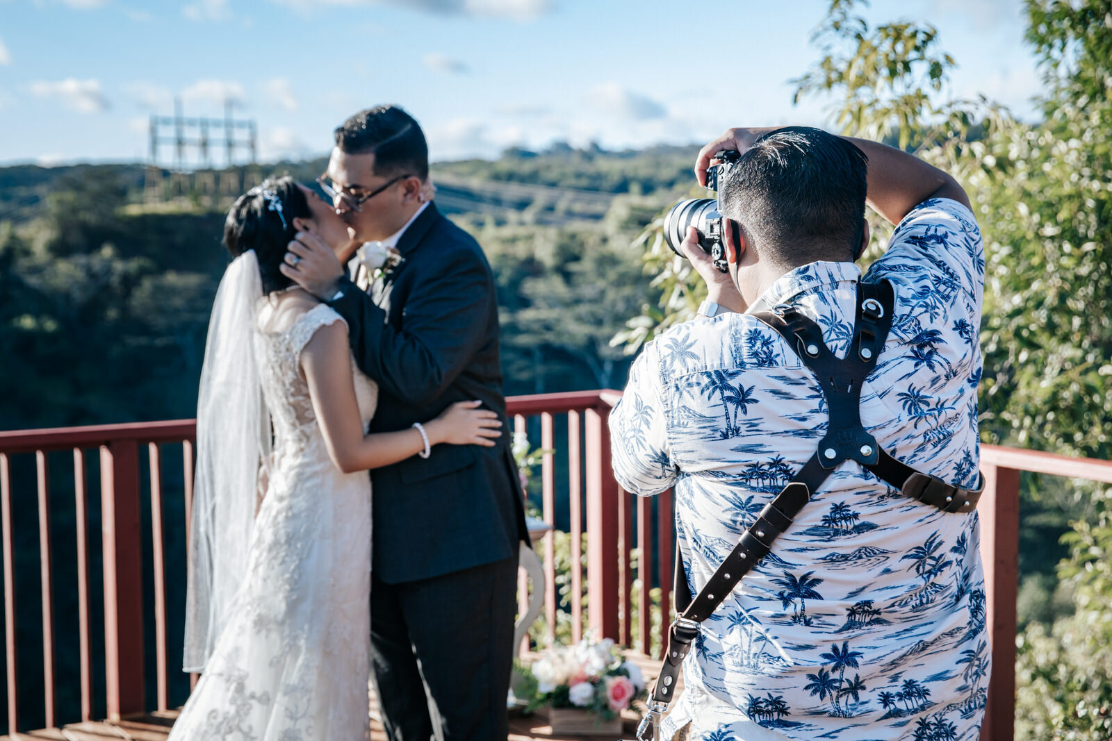 Cole Hofstra photographing a wedding couple in Calgary