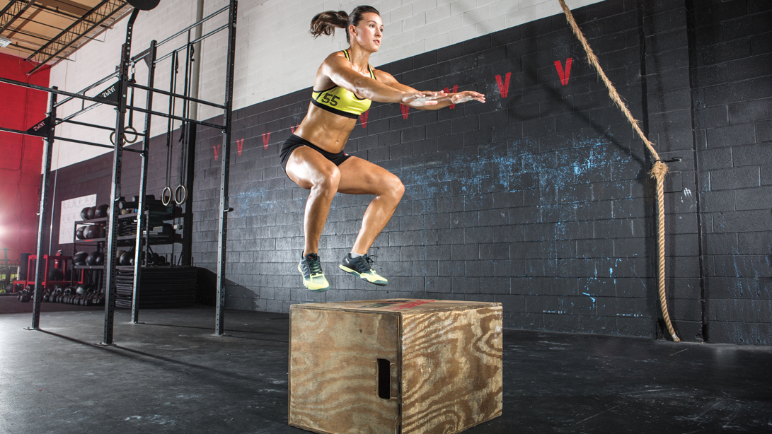 Athlete performing box jumps