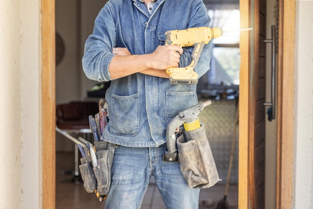 Professional handyman with tools ready for home repair and renovation in Surrey BC
