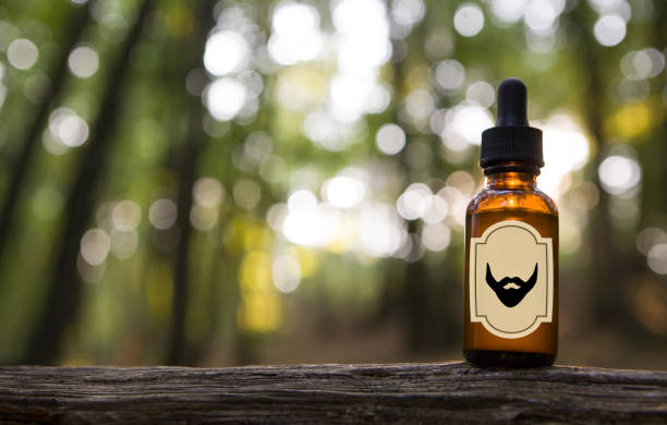 Green Beard premium beard oil bottle in natural forest setting