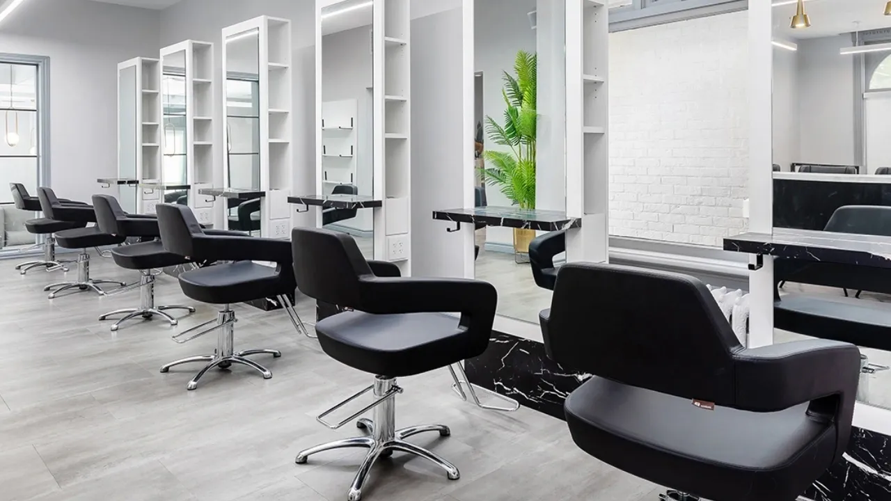 Modern hair salon interior with styling stations