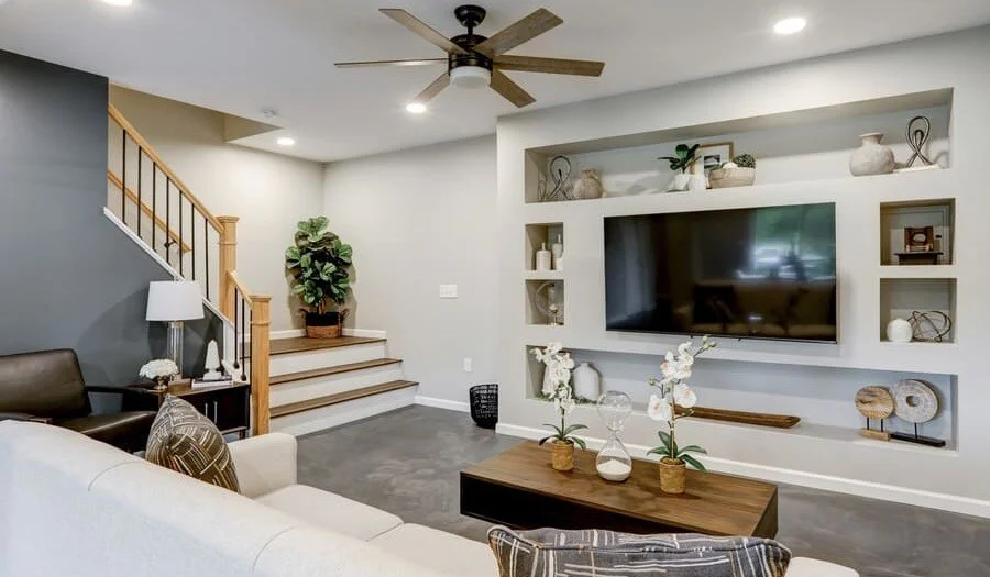 Finished basement living space with modern design