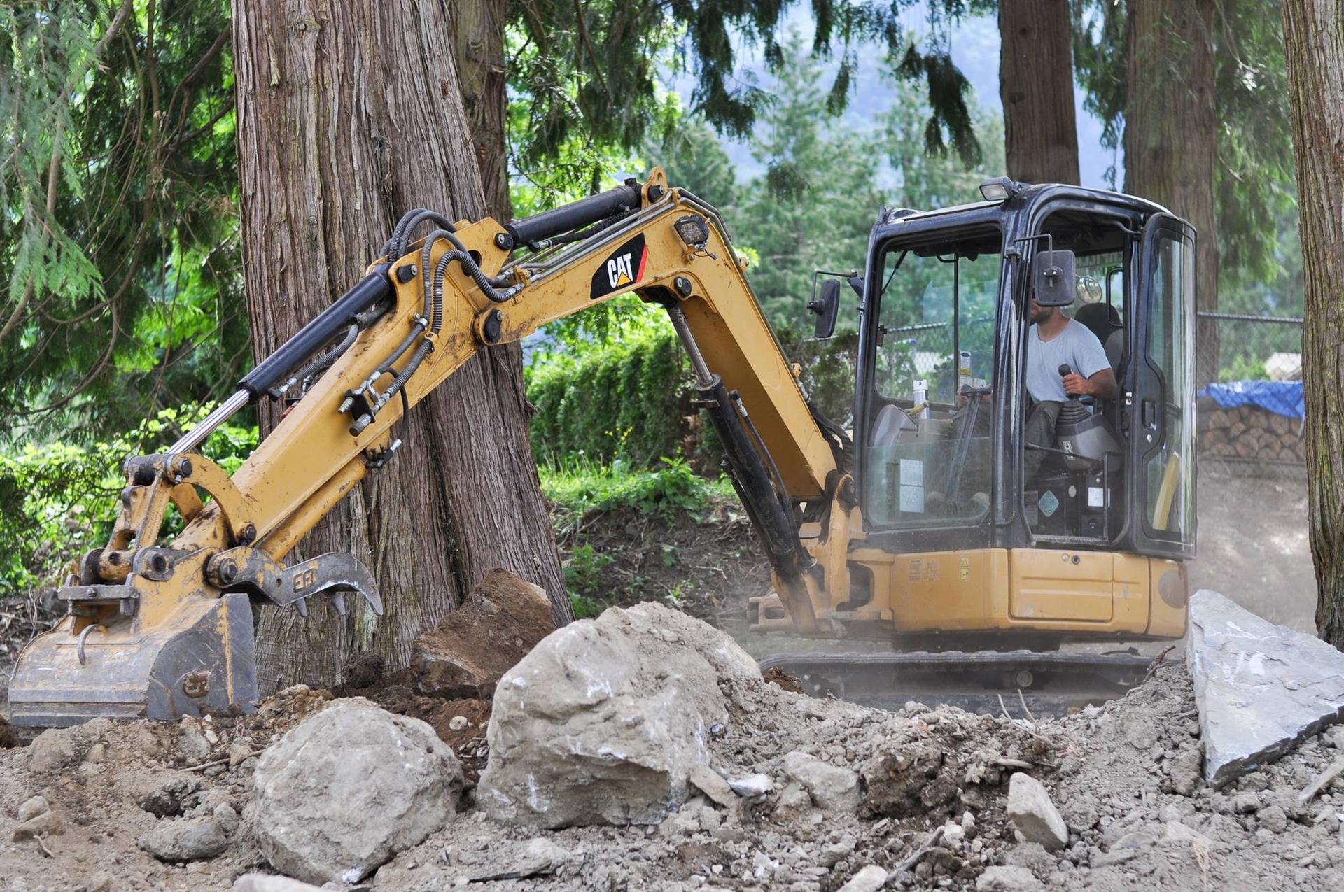 Excavator working at a residential site