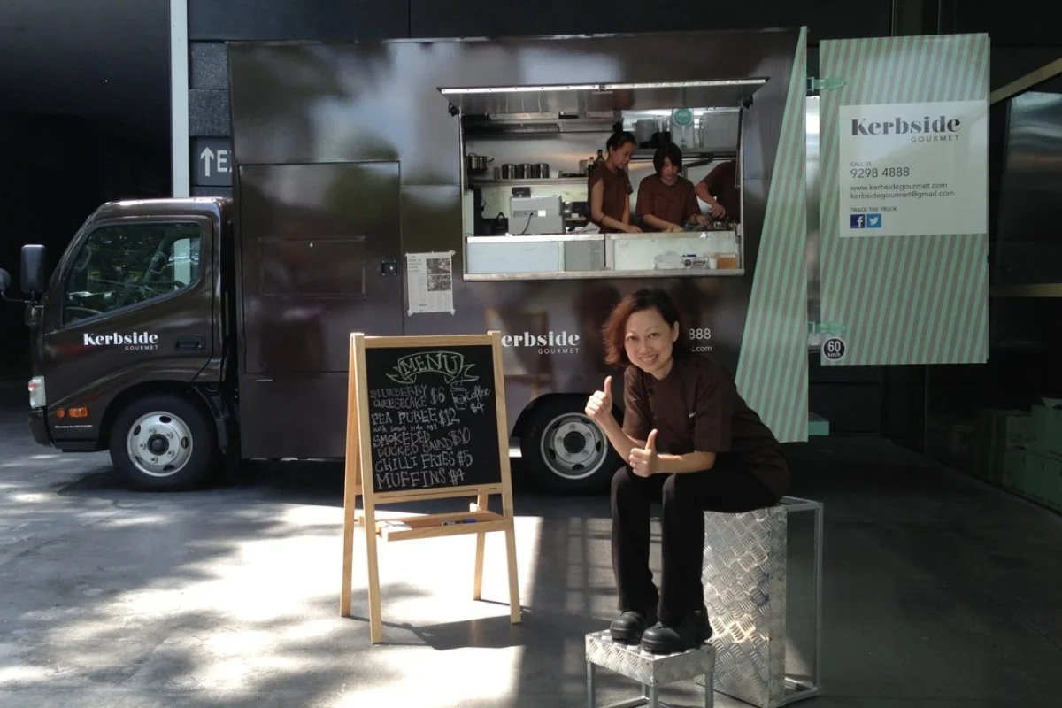 Le Tigre Cuisine food truck team serving customers