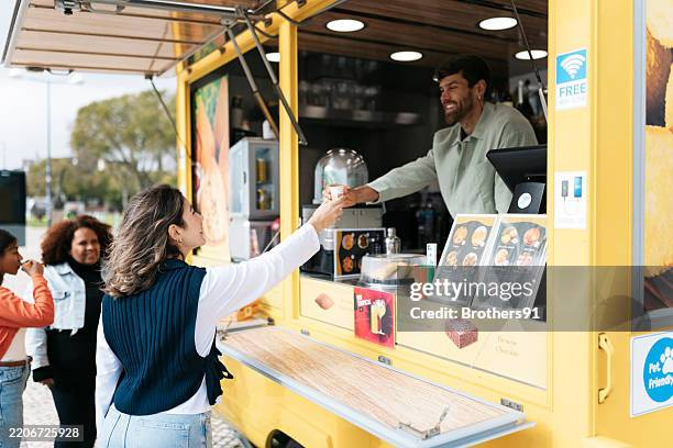 Customer ordering at food truck