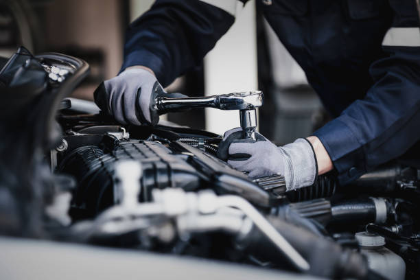Lisgar Motors certified mechanic working on a car engine