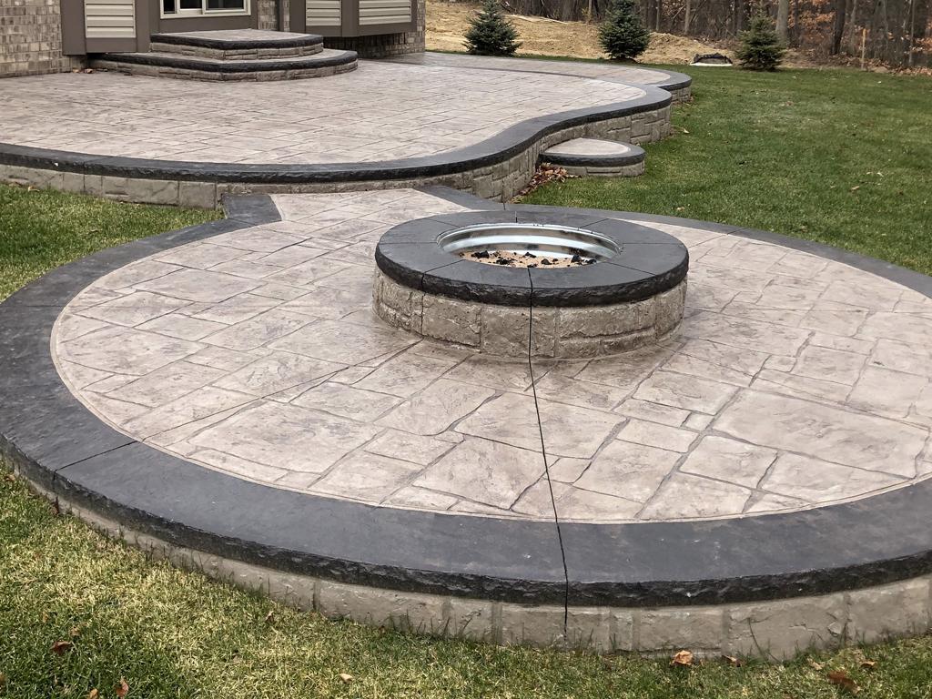 Stamped concrete patio with fire pit