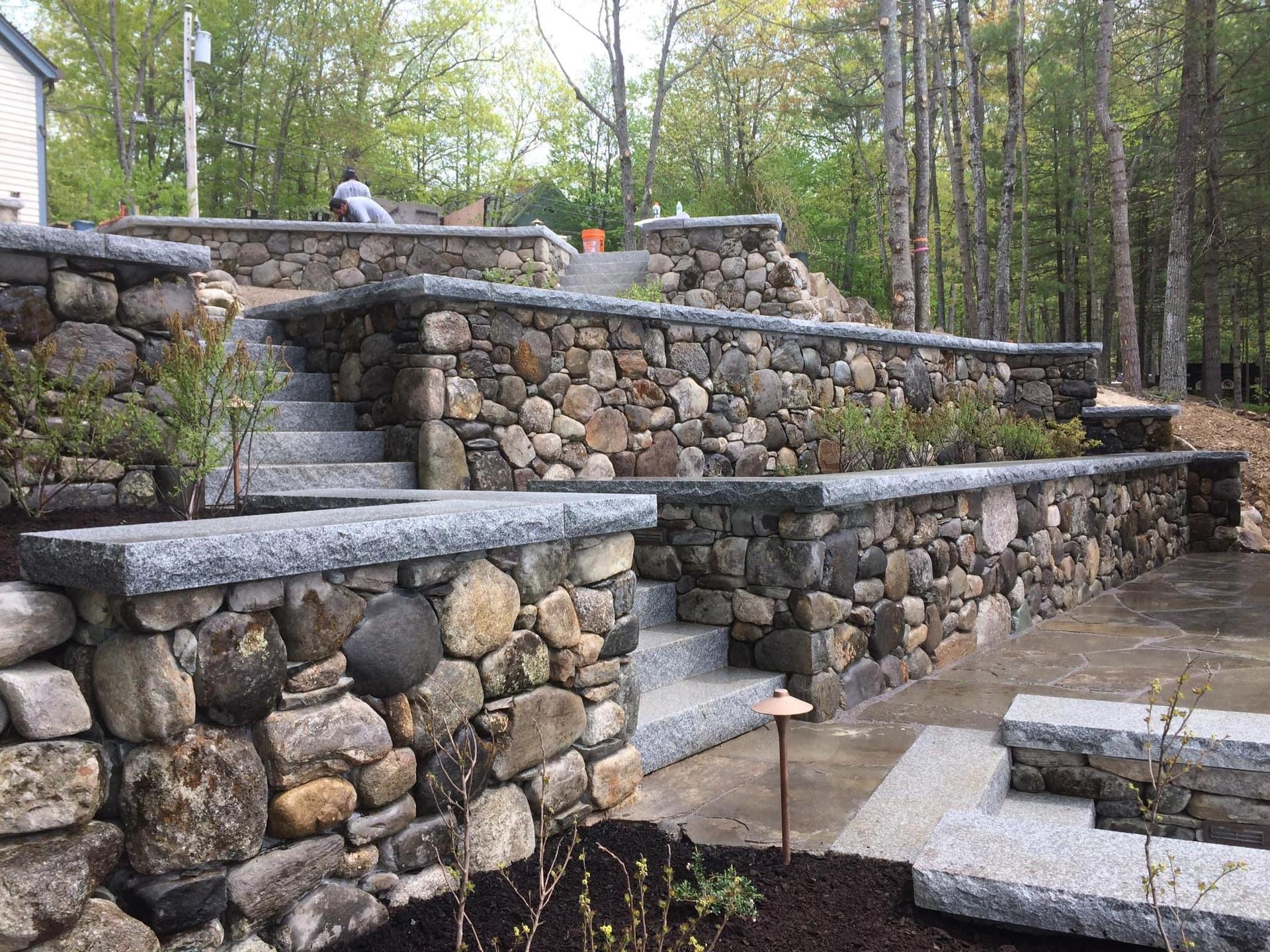 Natural stone retaining wall