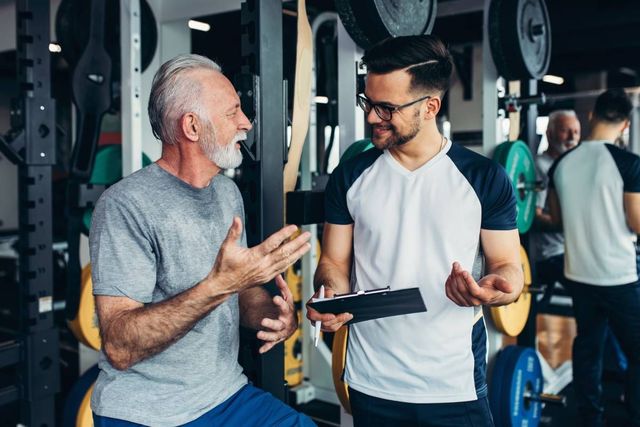 Quad Fit certified personal trainer coaching a client