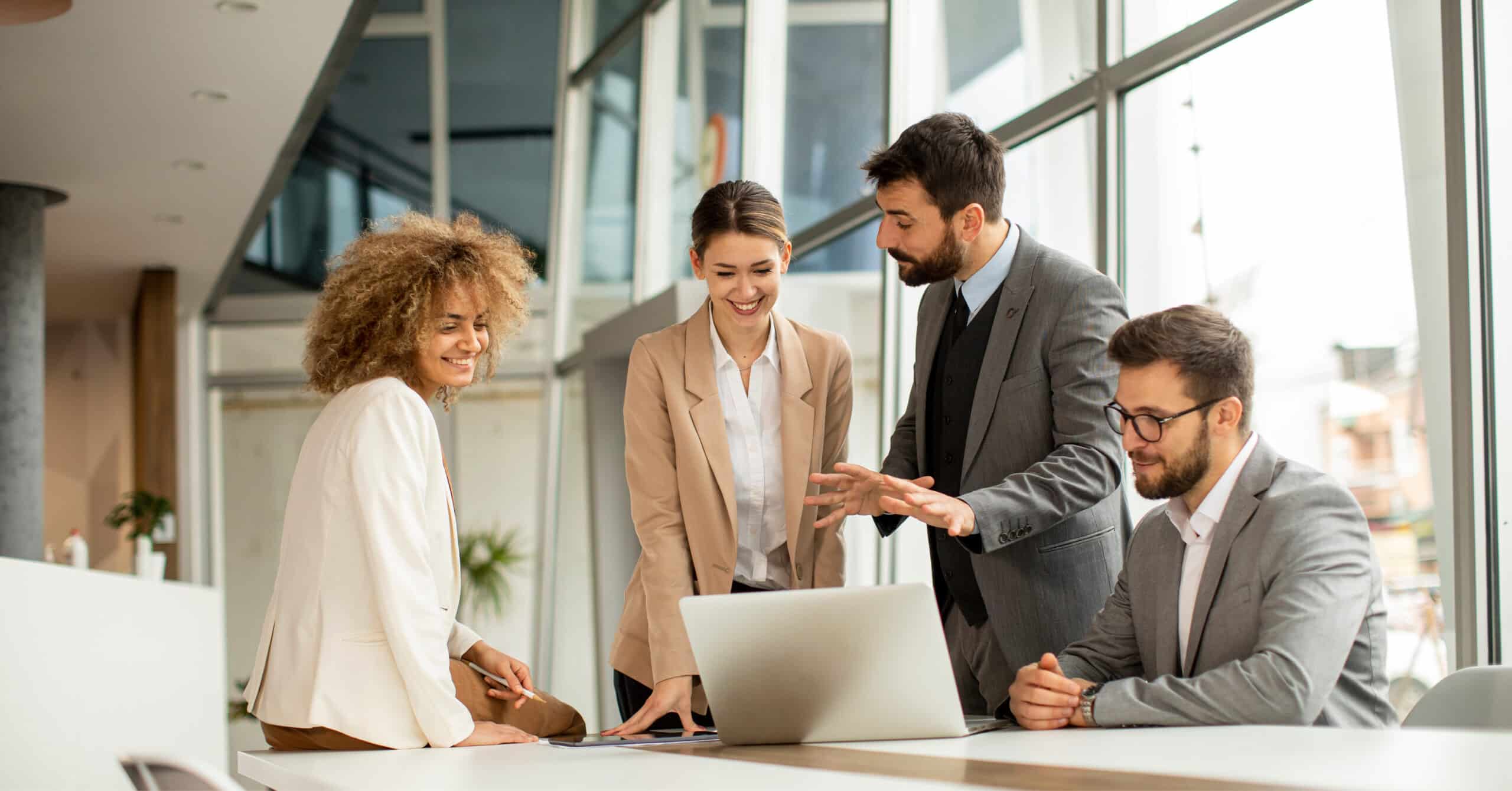 Professional PR consulting team in a modern boardroom meeting