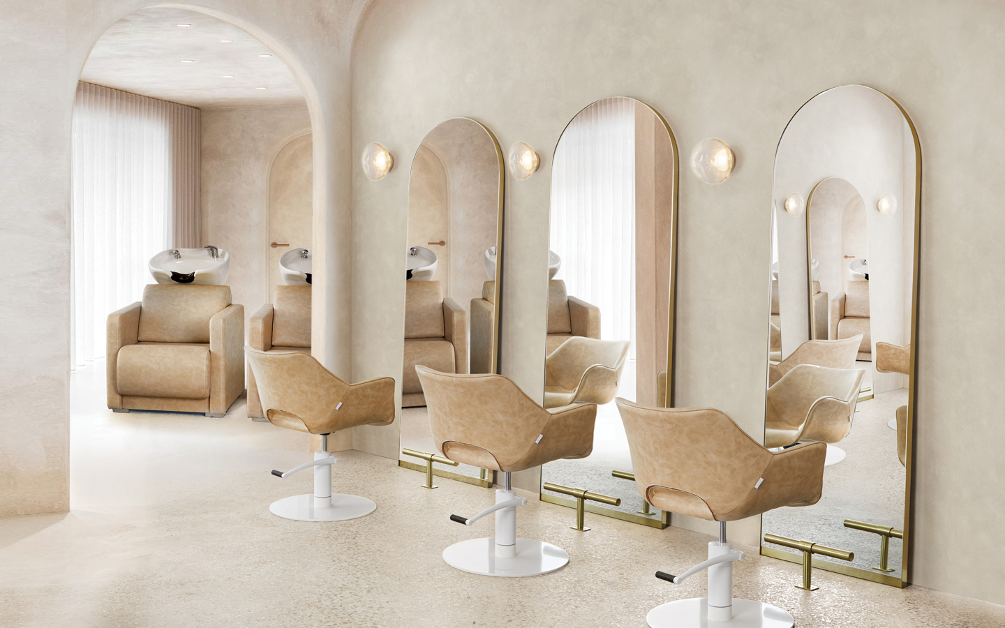 Modern Mediterranean-inspired salon interior with styling chairs
