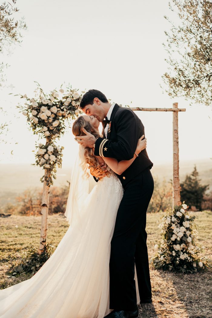Romantic wedding couple at outdoor ceremony