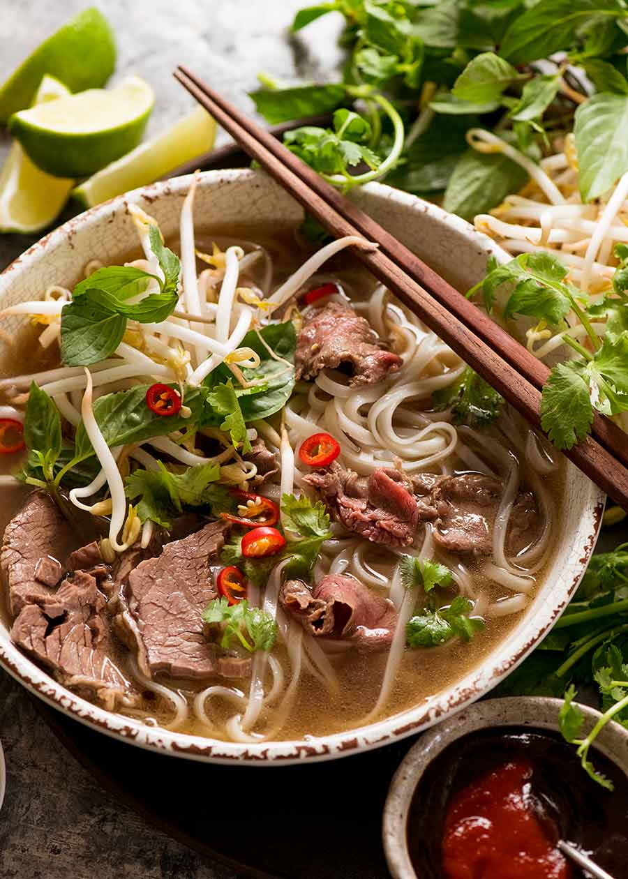 Steaming bowl of authentic Vietnamese beef pho