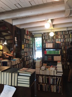 The cozy interior of The Word Bookstore with floor-to-ceiling bookshelves