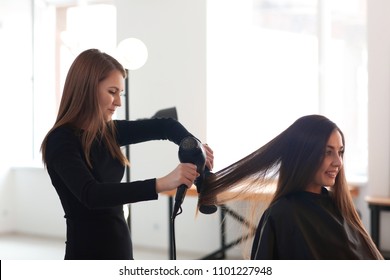 Professional stylist at work at Ther's Beauty Salon