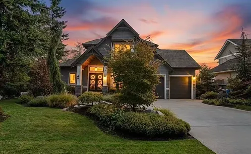 Stunning Surrey home at sunset representing Top Vision Realty