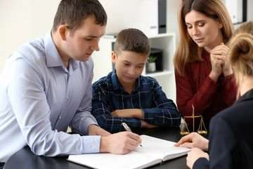 Family receiving compassionate legal consultation